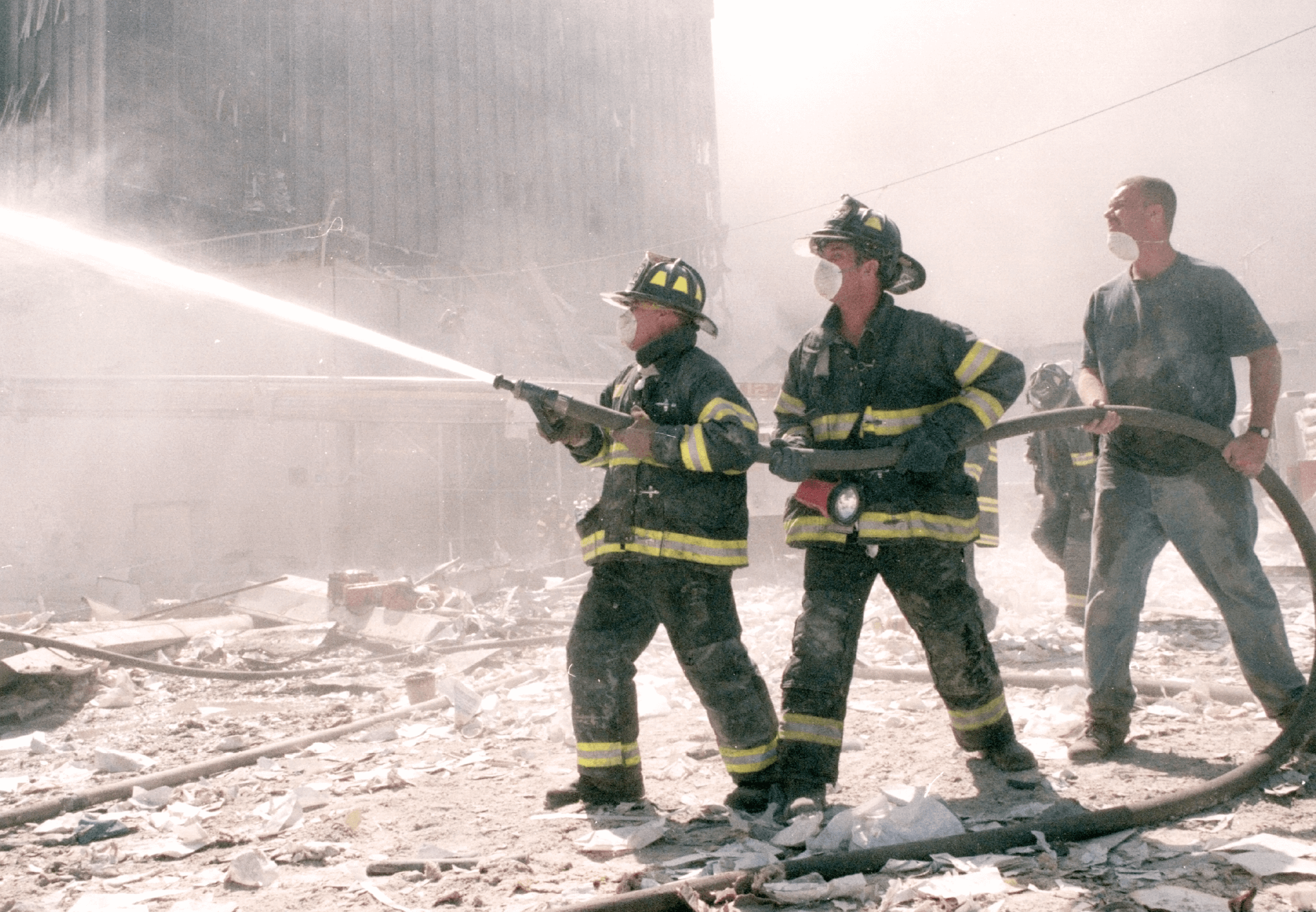 This is an image of 911 first responders being exposed to asbestos while on the job.