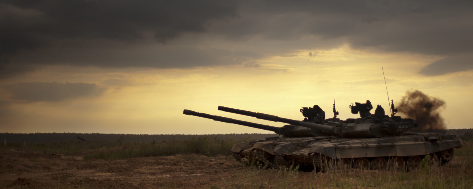This is an image of an Army member potentially being exposed to asbestos while driving a tank.