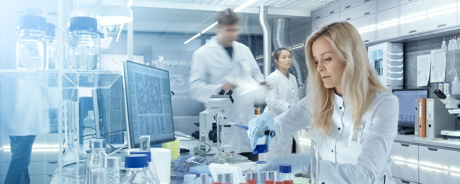 This is an image of a group of medical professionals working on new treatments, also known as emerging treatments.