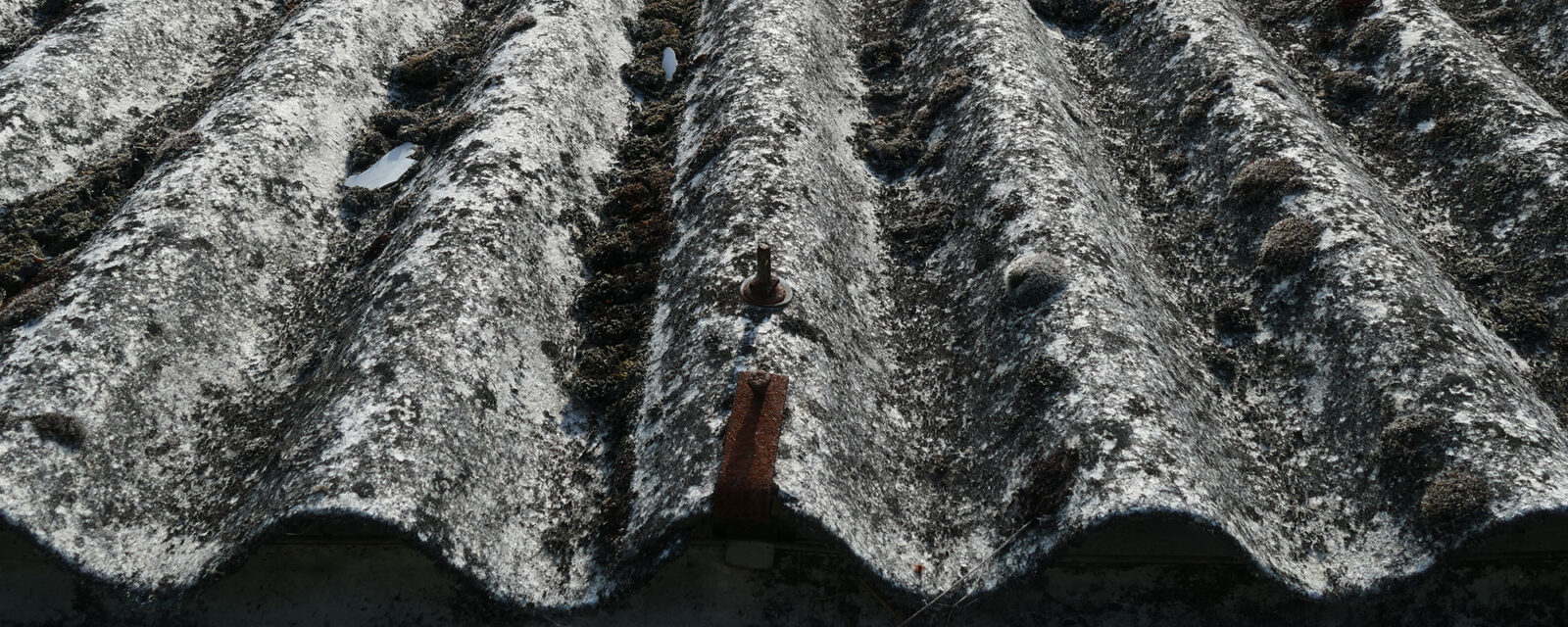 Image of roofing materials that most likely contains asbestos.