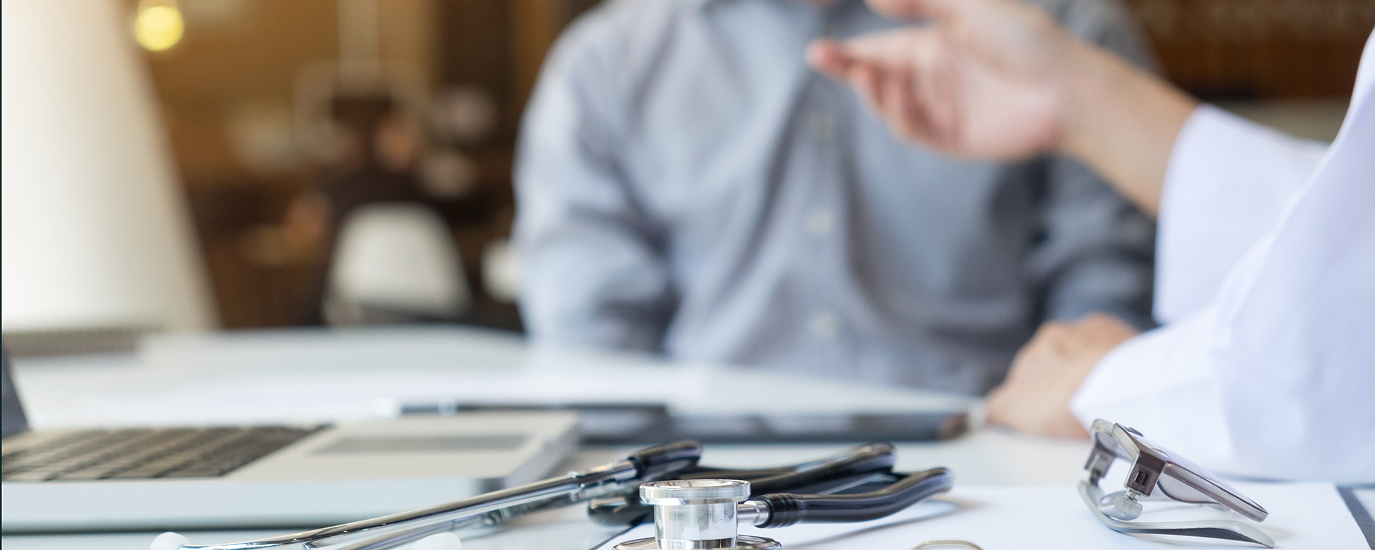 This is an image of a medical professional discussing the mesothelioma prognosis with a patient.