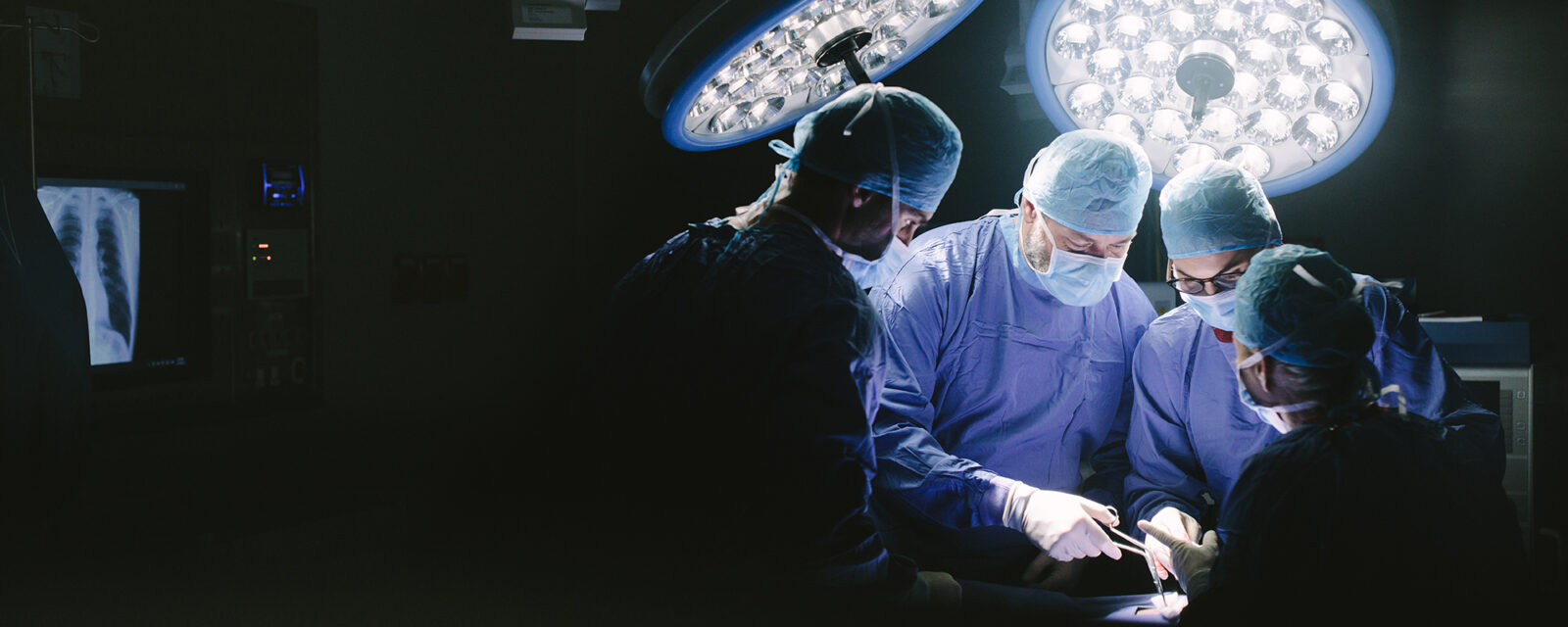 Image of surgeons performing a thoracentesis.