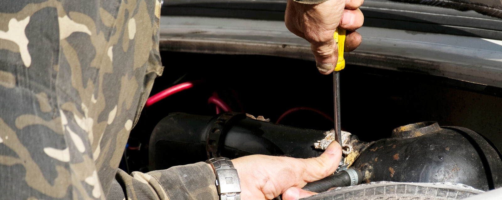 This is an image of a mechanic working on the job.