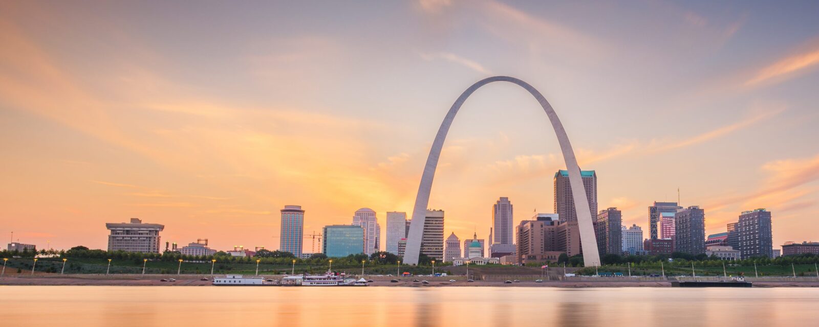 Riverview image of buildings, sky, and the St. Louis Arch in Missouri.