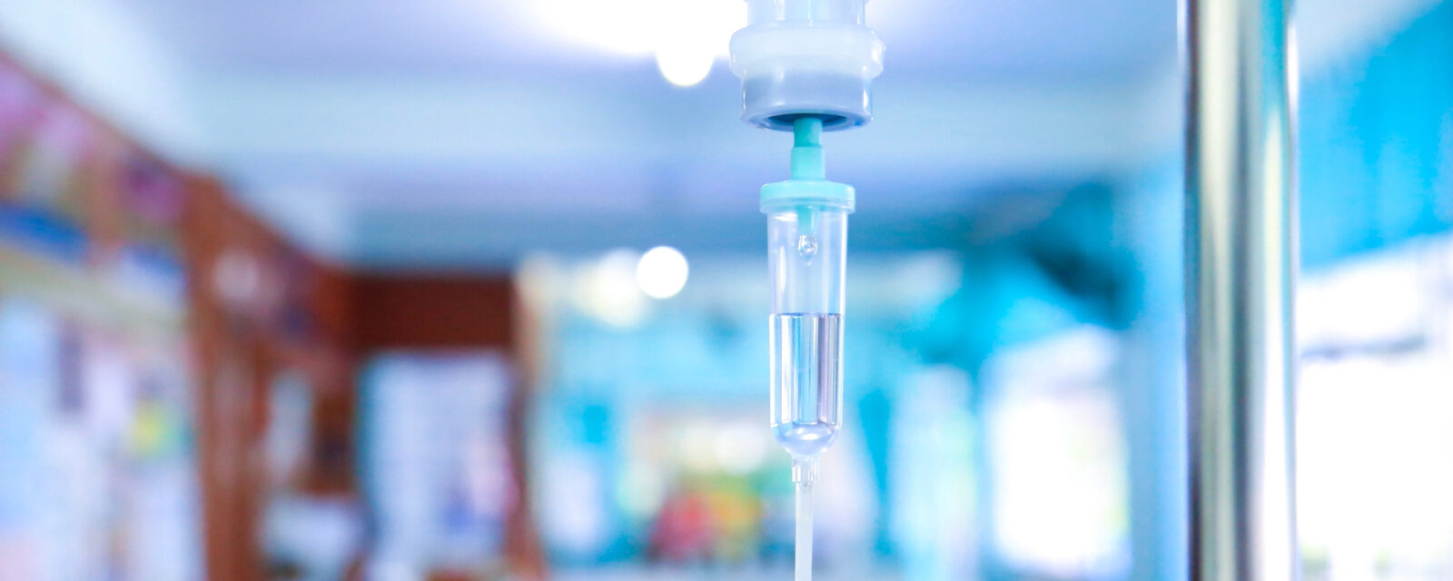 Image of an IV drip with the background out of focus.