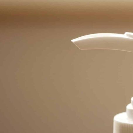 Close-up image of a hand sanitizer pump.