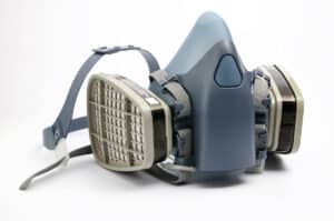 blue construction respiratory mask for PPE on white background