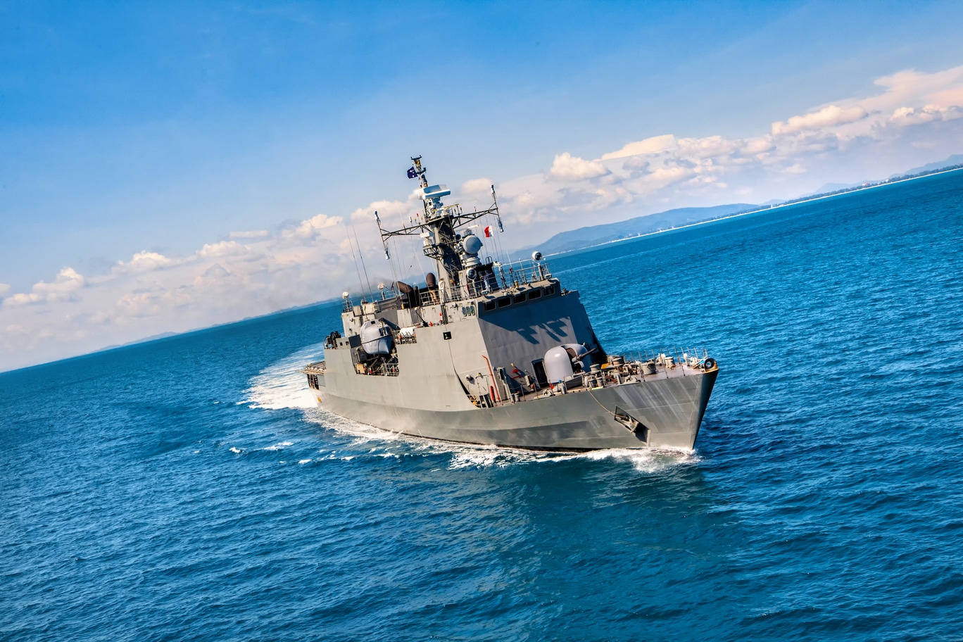 Photo of Navy ship on the water where military members were exposed to asbestos.