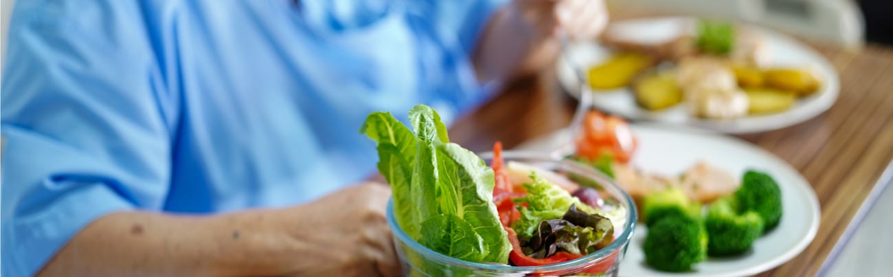 Healthy food on table in front of hospital patient