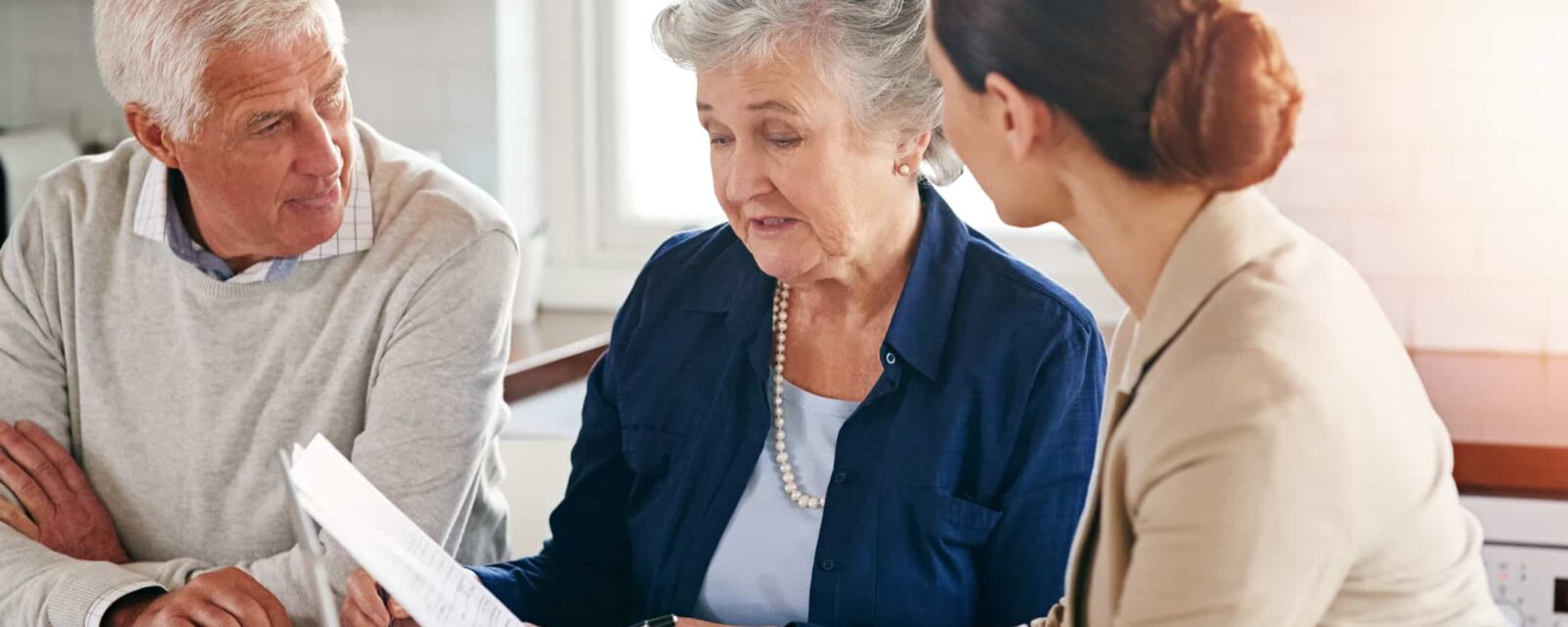 Caretaker helping mesothelioma patient make end of life decisions.