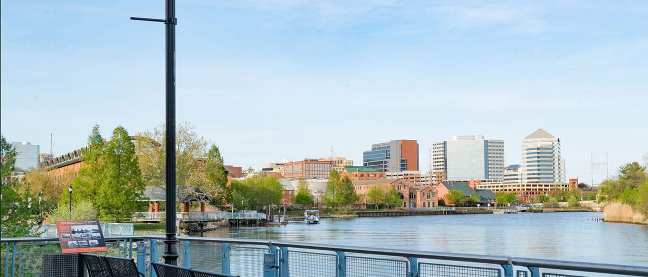 Images of a lake and city view in Delaware.