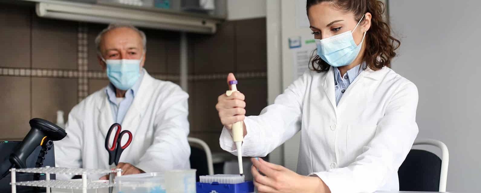 Histopathologist in a lab studying mesothelioma cancer.