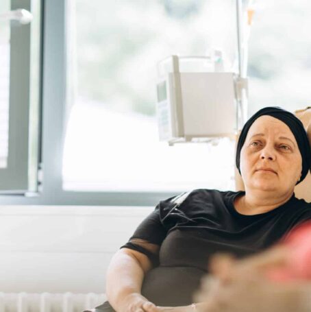 A women being corrected on some common myths about the side effects of mesothelioma.
