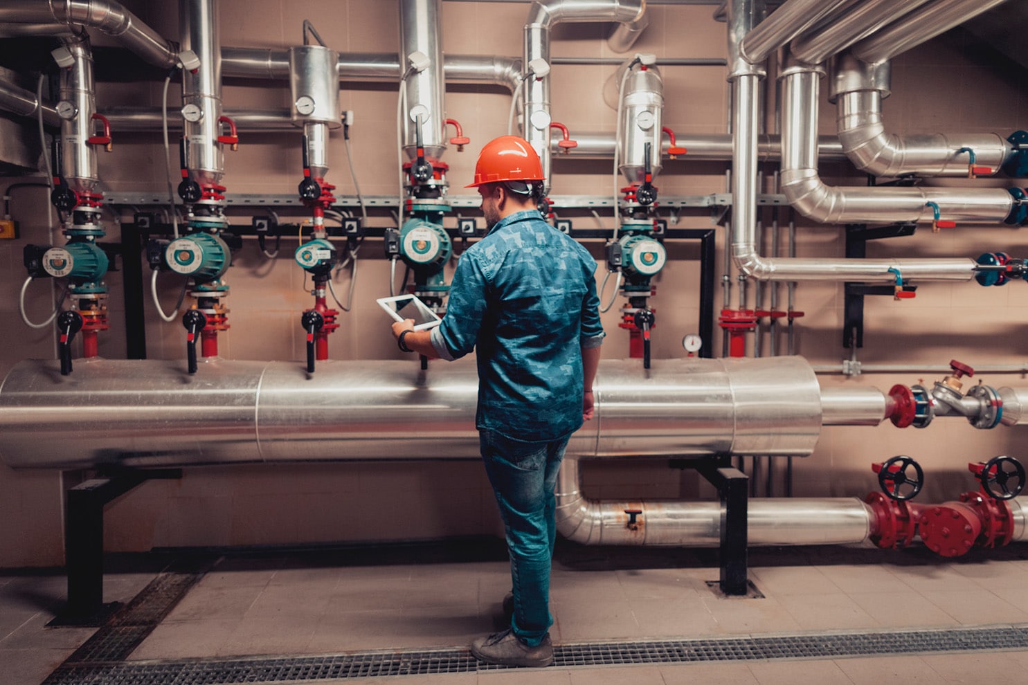 Man working at a place that has asbestos in boilers.