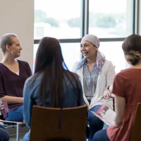 Women attending a mesothelioma support group one of the many coping strategies.