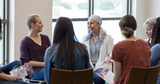 Women attending a mesothelioma support group one of the many coping strategies.