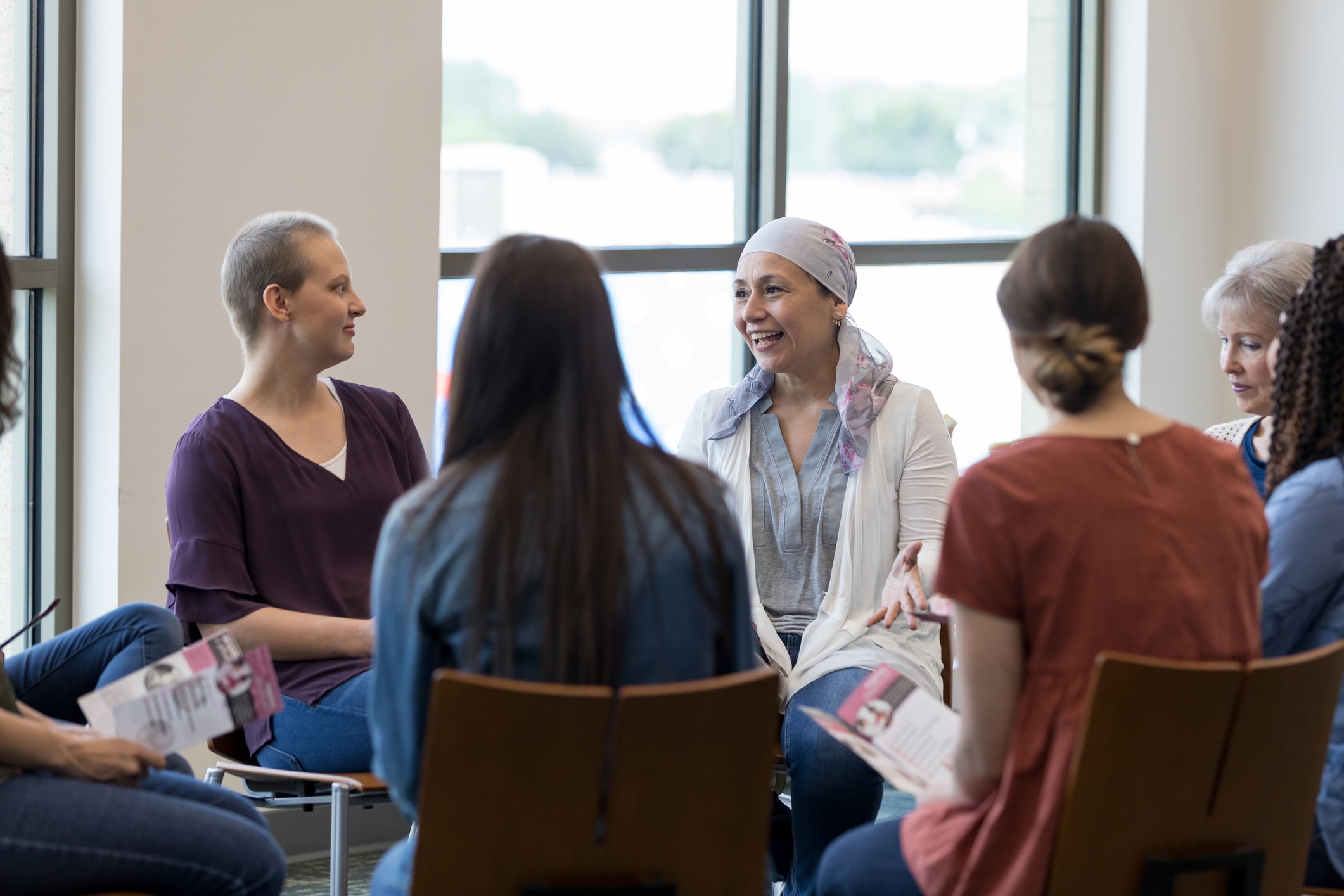 Women attending a mesothelioma support group one of the many coping strategies.