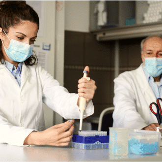 Histopathologist in a lab studying mesothelioma cancer.