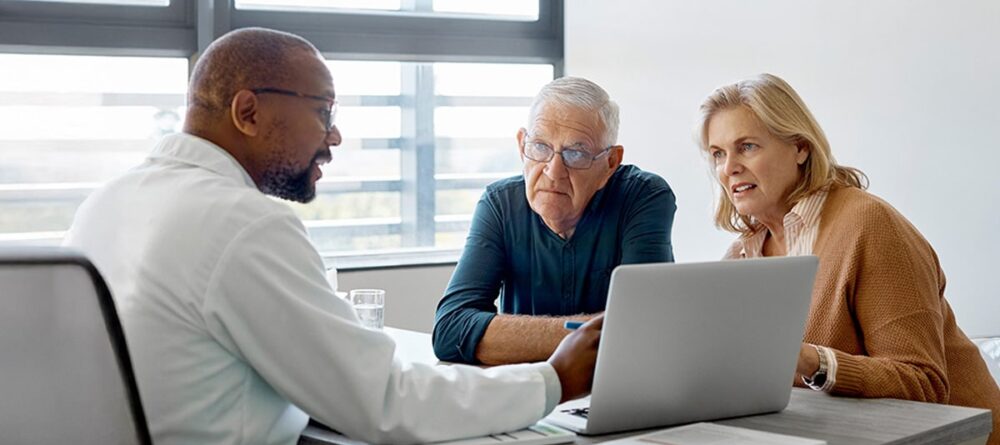 Mesothelioma patient consulting with medical specialist about treatment options