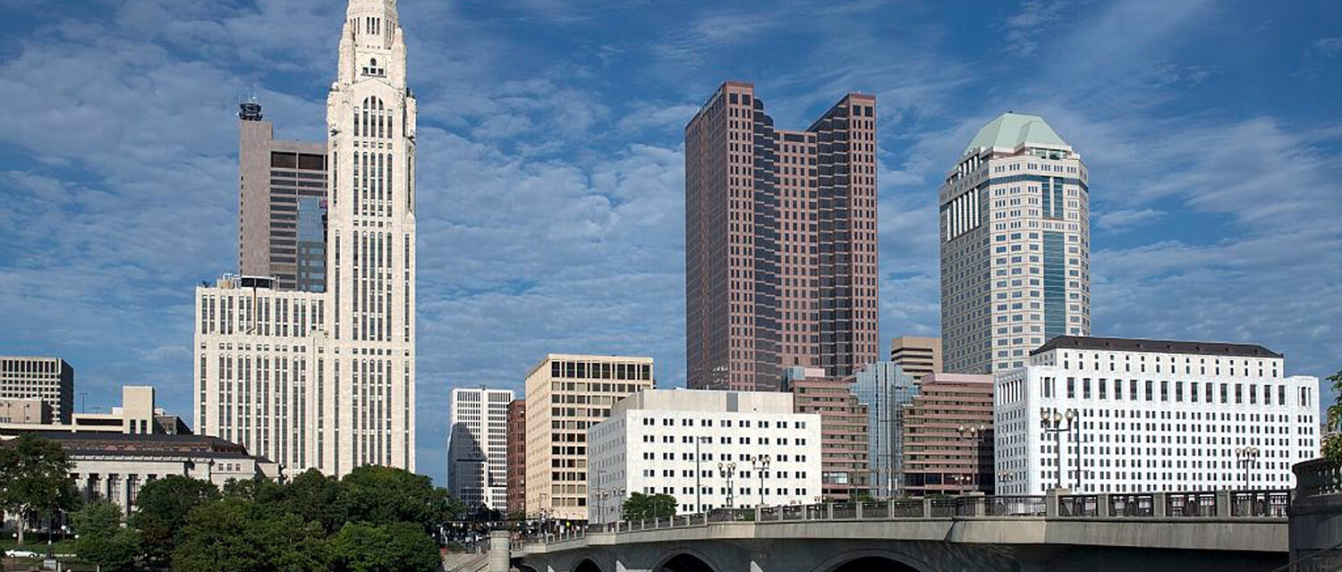 Columbus, Ohio skyline featuring downtown office buildings and the Scioto River, representing Ohio communities affected by occupational and environmental asbestos exposure.